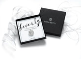 70th birthday seven-ring necklace in silver finish, with seven interlinked rings in a Bijou Betty gift box.