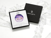 14k gold-plated sterling silver 6.5mm Leo zodiac stud earrings with CZ in Bijou Betty gift box with Leo card.