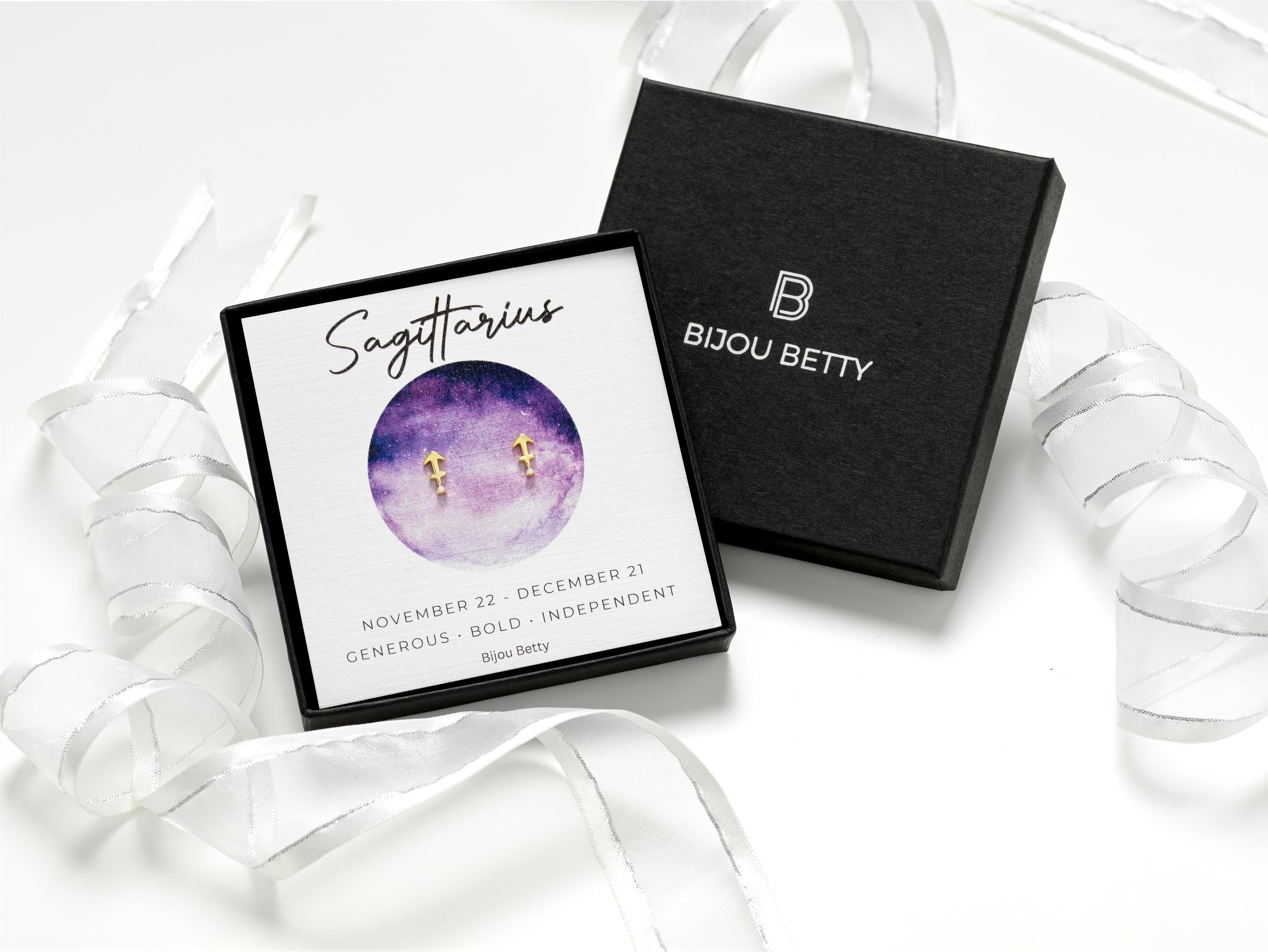 14k gold-plated 6.5mm Sagittarius zodiac stud earrings with CZ in Bijou Betty gift box with Sagittarius card.