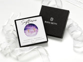 14k gold-plated 6.5mm Sagittarius zodiac stud earrings with CZ in Bijou Betty gift box with Sagittarius card.