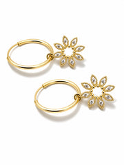 Gold hoop earrings with floral designs and clear stones on a white background