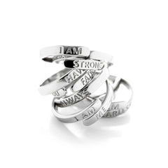A selection of Bijou Betty Affirmation wrap rings in sterling silver.