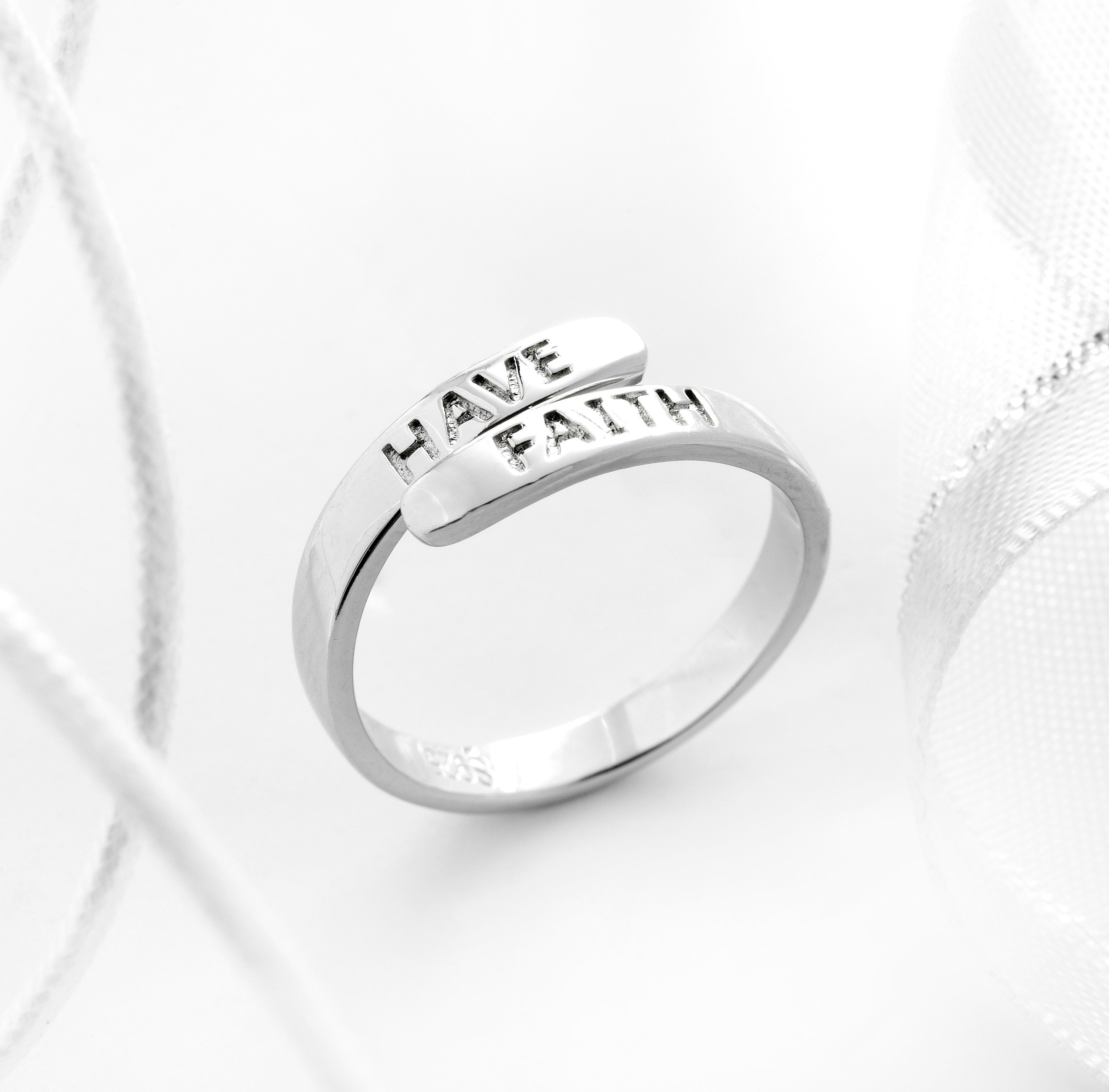 Sterling silver have faith affirmation ring with engraving.