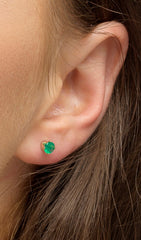 Model wearing gold filled green onyx stud earrings.