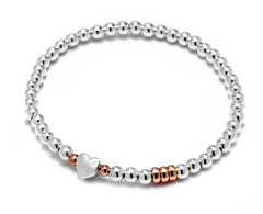 Sterling silver 30th birthday heart bracelet with rose gold rings.
