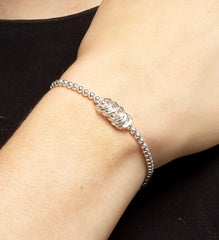 Sterling silver 50th birthday bracelet with 5 rings in Bijou Betty gift box.