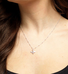 Model wearing sterling silver bumblebee necklace.