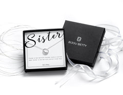 Sterling silver sister circle necklace with CZ in Bijou Betty gift box.