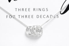Sterling silver 30th birthday circle necklace with three rings.