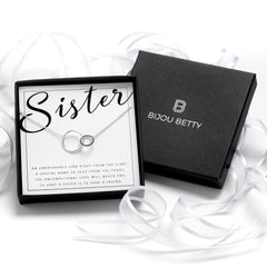 Sterling silver sisters 2 interlocking circles with black CZ stone necklace in Bijou Betty gift box.