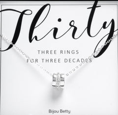 Sterling silver 30th birthday decades necklace with 3 rings in Bijou Betty gift box.