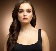 Model wearing sterling silver friendship circle necklace.