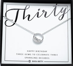 Sterling silver 30th birthday CZ necklace with three stones.