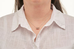 Model wearing sterling silver 40th birthday 4 ring necklace in gift box.