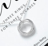 Sterling silver 30th birthday circle necklace with three rings.