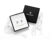 Sterling silver 10mm circle stud earrings with black CZ in Bijou Betty luxury gift box with bonus daughter card, ideal for birthdays.