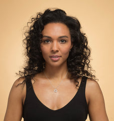 Model wearing silver 21st birthday necklace.