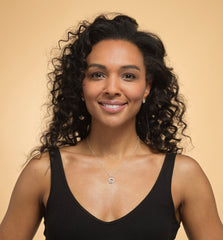 Model wearing sterling silver friendship 3 ring necklace.