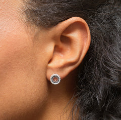 Model wearing sterling silver 18th birthday circle earrings.