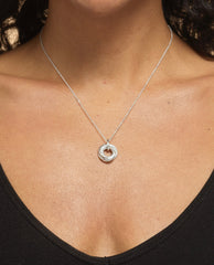 Model wearing sterling silver 60th birthday 6 ring necklace.