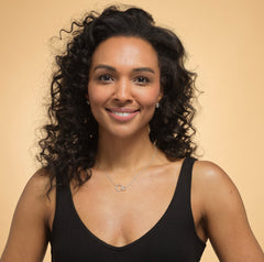 Model wearing sterling silver niece circle necklace.