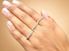 Model wearing sterling silver fidget spinner ring.