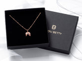 Rose Gold Angel Wing Sympathy Necklace in gift box.