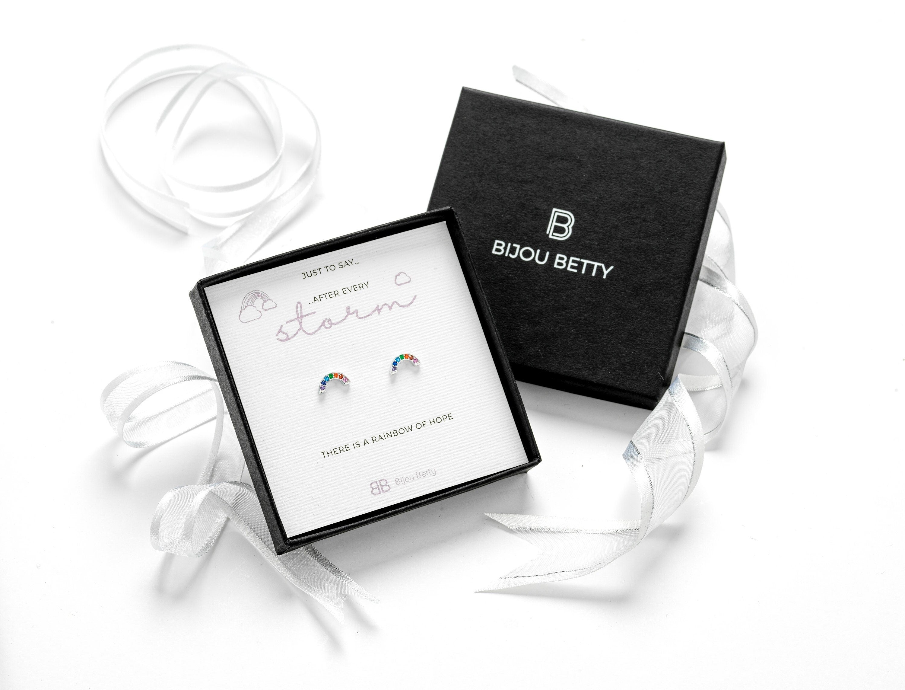 Sterling silver rainbow stud earrings in Bijou Betty gift box.