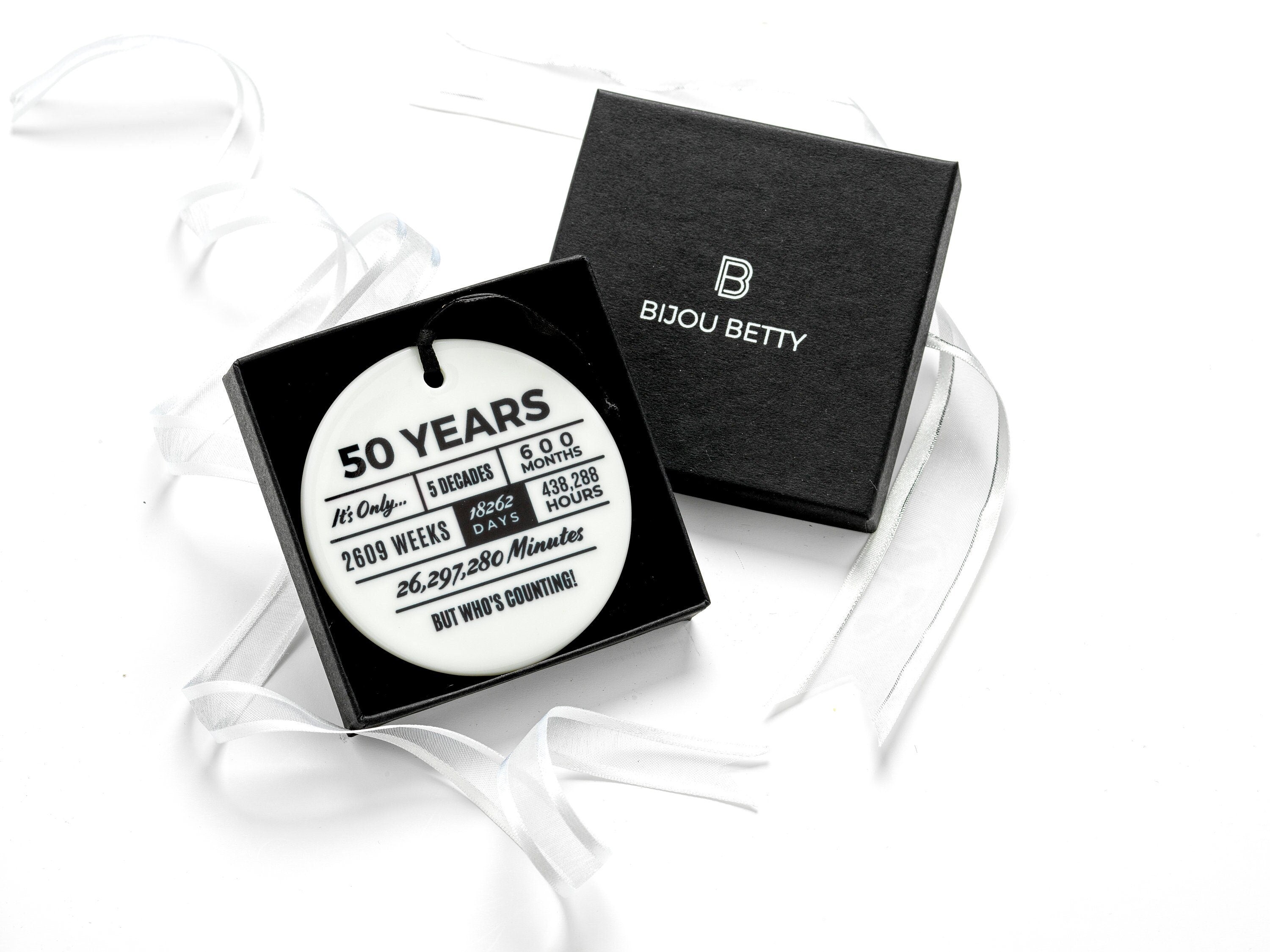 Ceramic 50th birthday keepsake ornament in gift box.