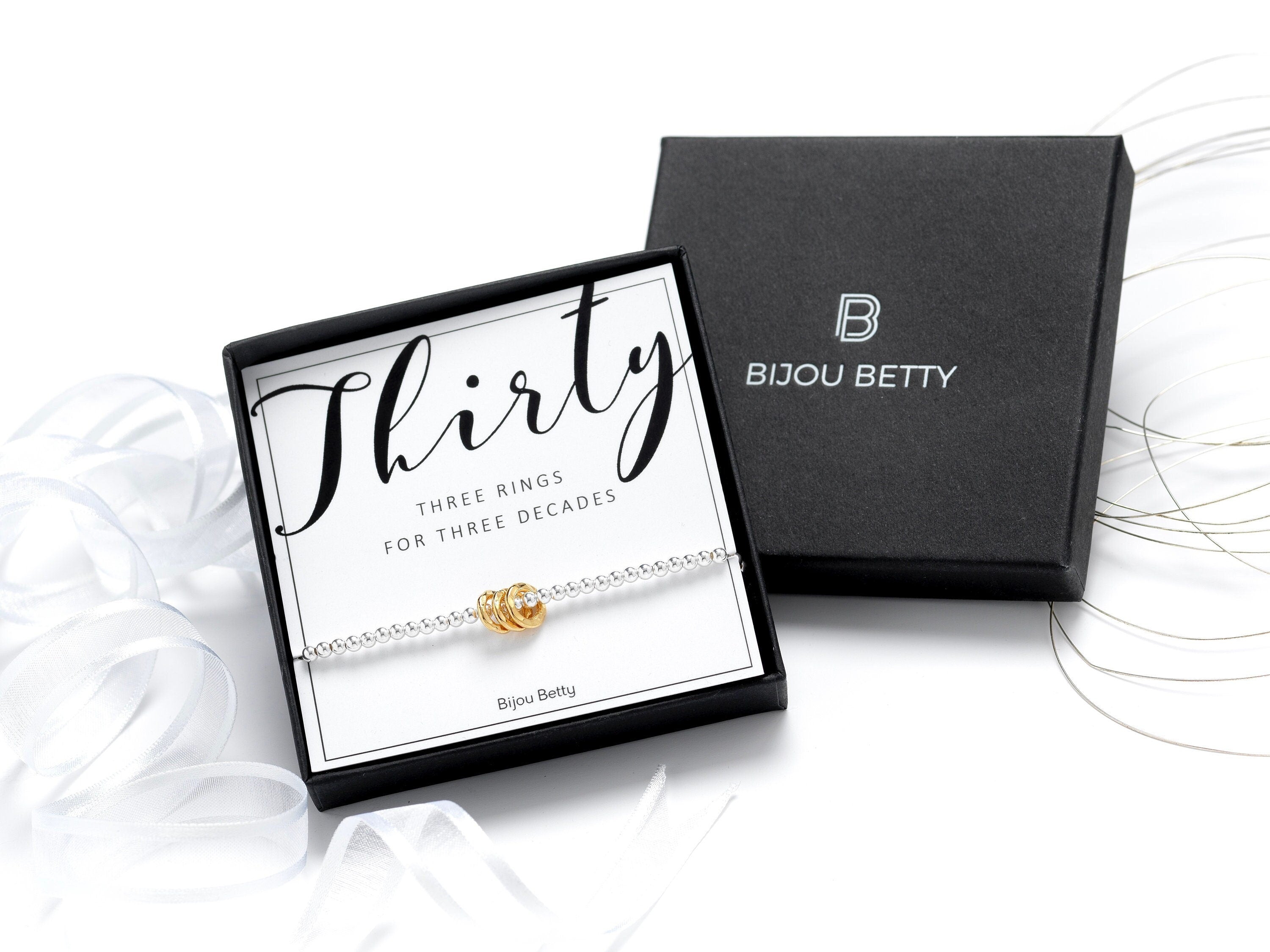 Sterling silver 30th birthday bracelet with 3 rings in Bijou Betty gift box.