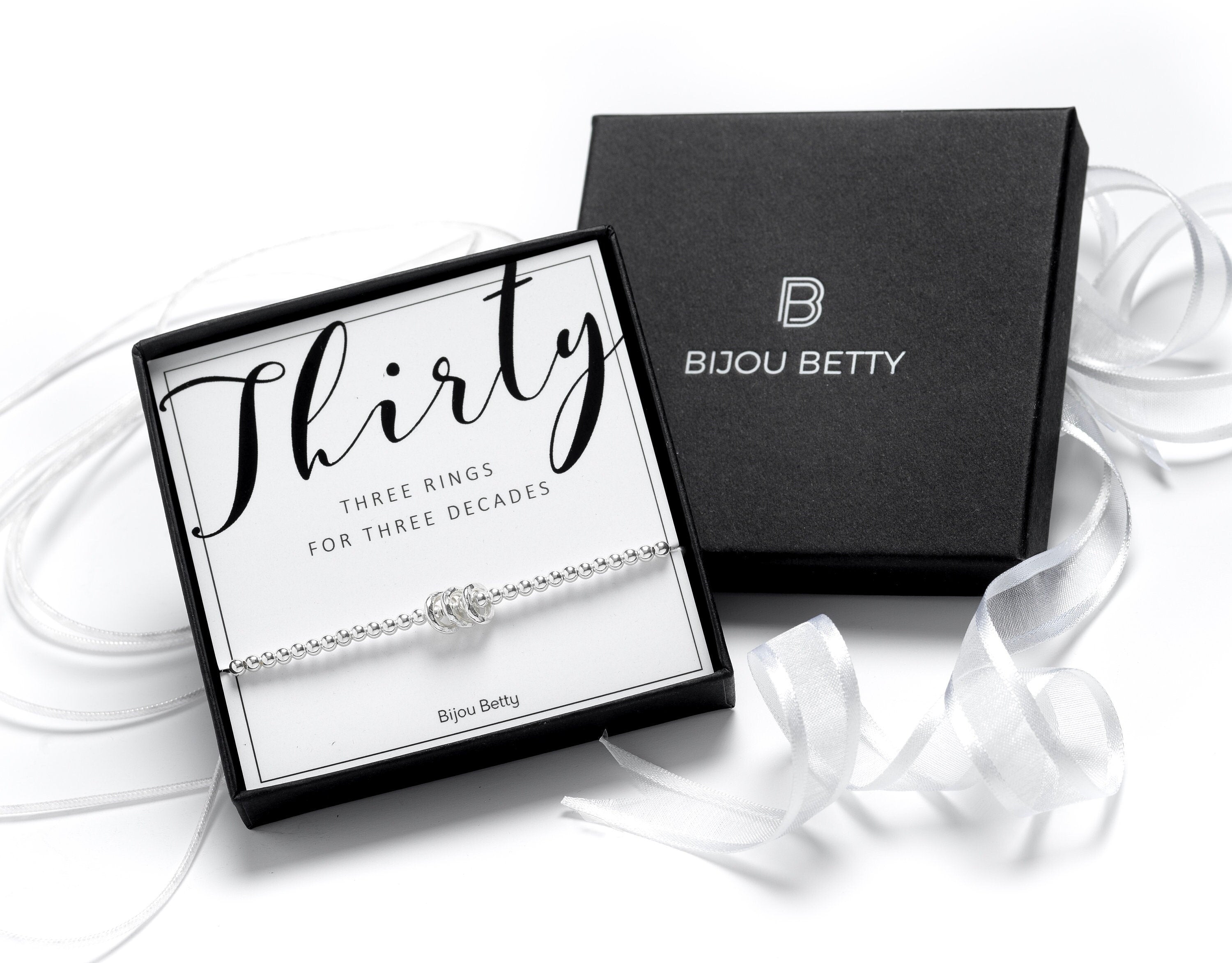 Sterling silver 30th birthday bracelet with 3 rings in Bijou Betty gift box.