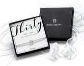 Sterling silver 30th birthday bracelet with 3 rings in Bijou Betty gift box.