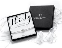 Sterling silver 30th birthday bracelet with 3 rings in Bijou Betty gift box.