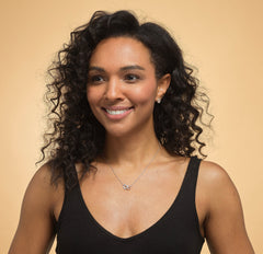 Model wearing 925 sterling silver necklace, best friend gift, cubic zirconia heart and circle pendant.