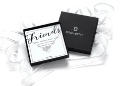 Sterling silver friend heart necklace with CZ in Bijou Betty gift box.