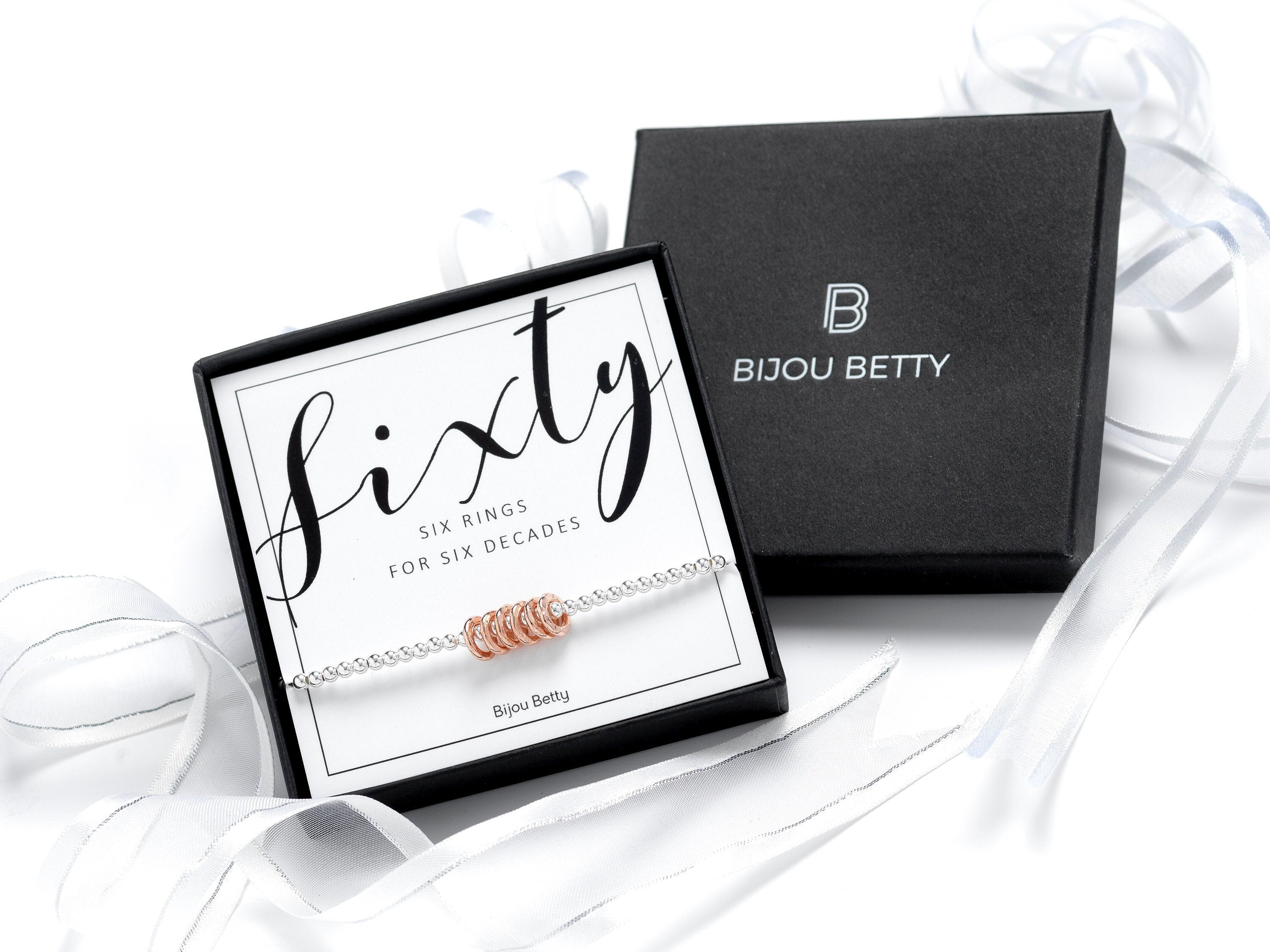 Sterling silver 60th birthday bracelet, gift for mum, 925 silver with rose gold vermeil rings, stretch cord, in Bijou Betty gift box.