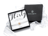 Sterling silver decades bracelet, milestone birthday gift, 925 silver with mixed-metal rings, stretch cord, in Bijou Betty gift box.