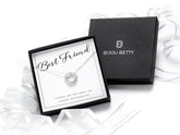 Sterling silver friendship necklace with three-ring pendant in Bijou Betty gift box.