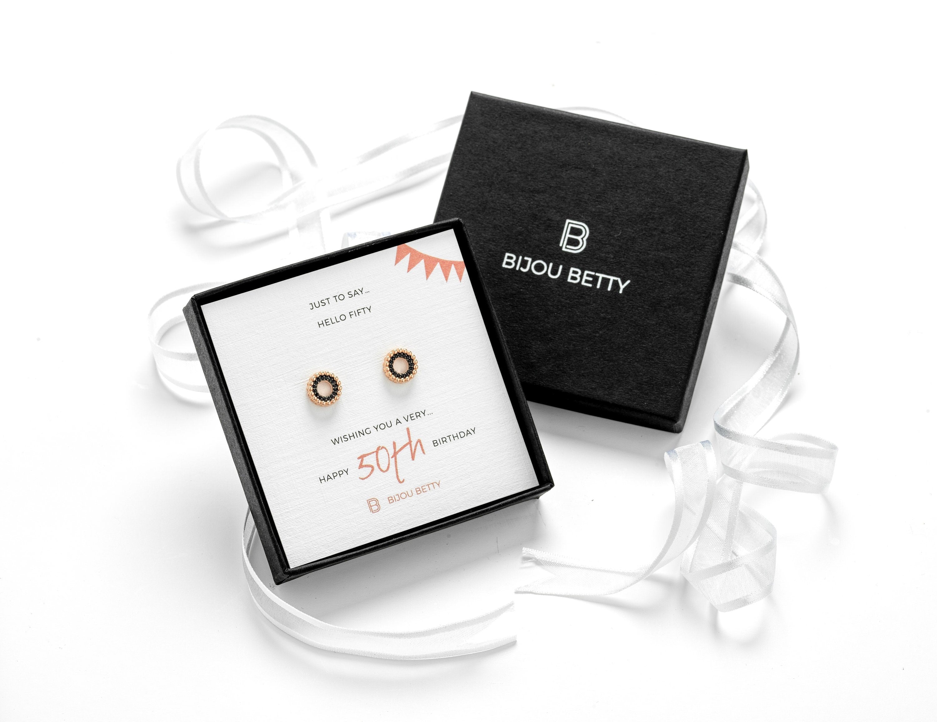 Sterling silver 50th birthday earrings with black CZ in Bijou Betty gift box.