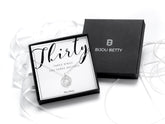 Sterling silver 30th birthday three-ring CZ necklace in gift box