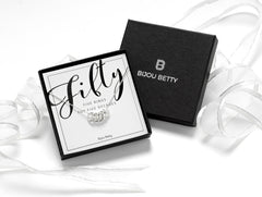 Solid sterling silver 50th birthday necklace featuring 5 hammered rings, each symbolising a decade. Comes with a choice of 16, 18, or 20-inch chain. Includes a gift box, bag, and tissue paper, perfect for celebrating 5 decades of life.