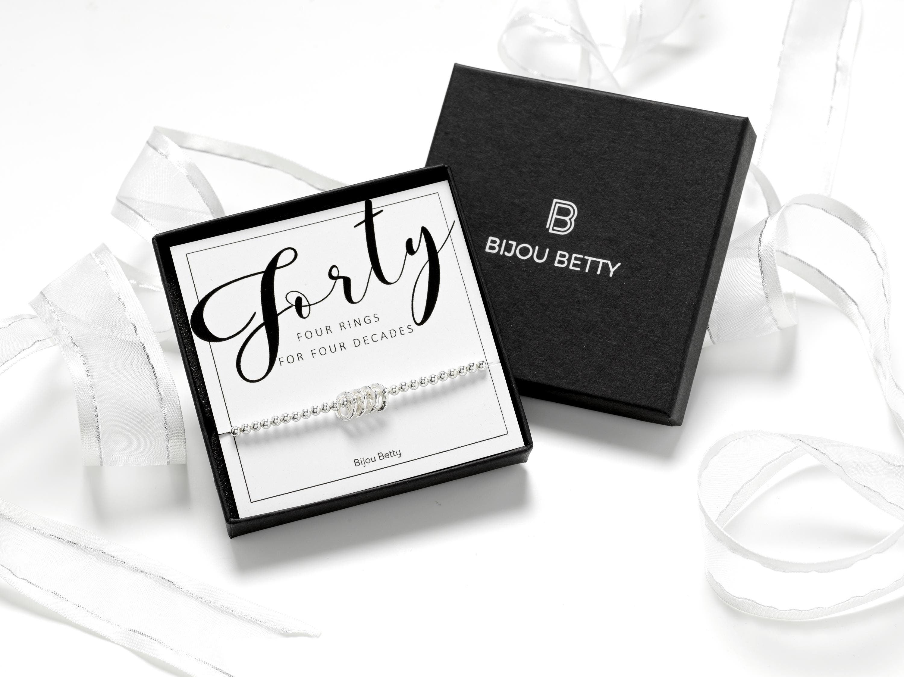 Sterling silver 40th birthday 4 ring bracelet in Bijou Betty gift box.