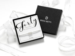 Sterling silver 40th birthday 4 ring bracelet in Bijou Betty gift box.