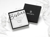 Sterling silver necklace or bracelet with interlinked circles, symbolising sisterly bonds. Adjustable sizes and includes gift box, tissue paper, and a message card. Perfect gift for sister on birthdays, Christmas, or any special occasion.