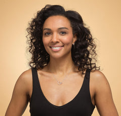 Model wearing sterling silver friendship circle necklace.