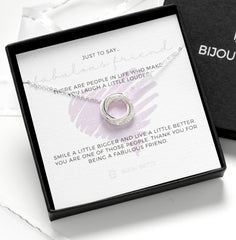 Sterling silver friendship necklace with three-ring pendant.