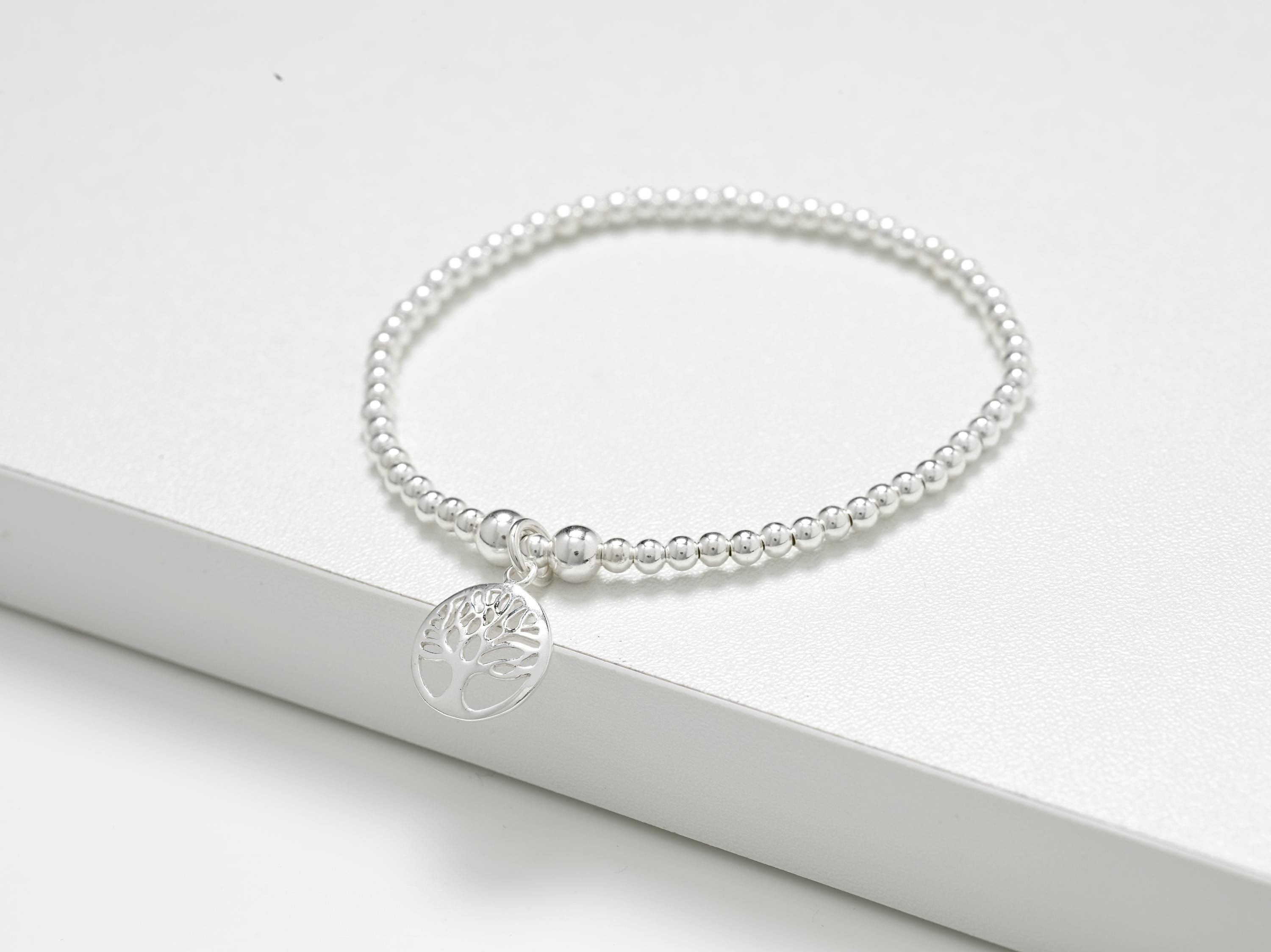 Solid sterling silver stretch bead Tree of Life bracelet. Presented in luxury gift box and matching gift bag. Perfect gift for Birthdays, Christmas or a treat for yourself.