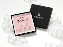 Sterling silver earrings with cubic zirconia, perfect 30th birthday gift for daughter. Includes gift box, bag, tissue, and card: To a wonderful daughter on her 30th birthday, wishing you endless joy and success in the years ahead.