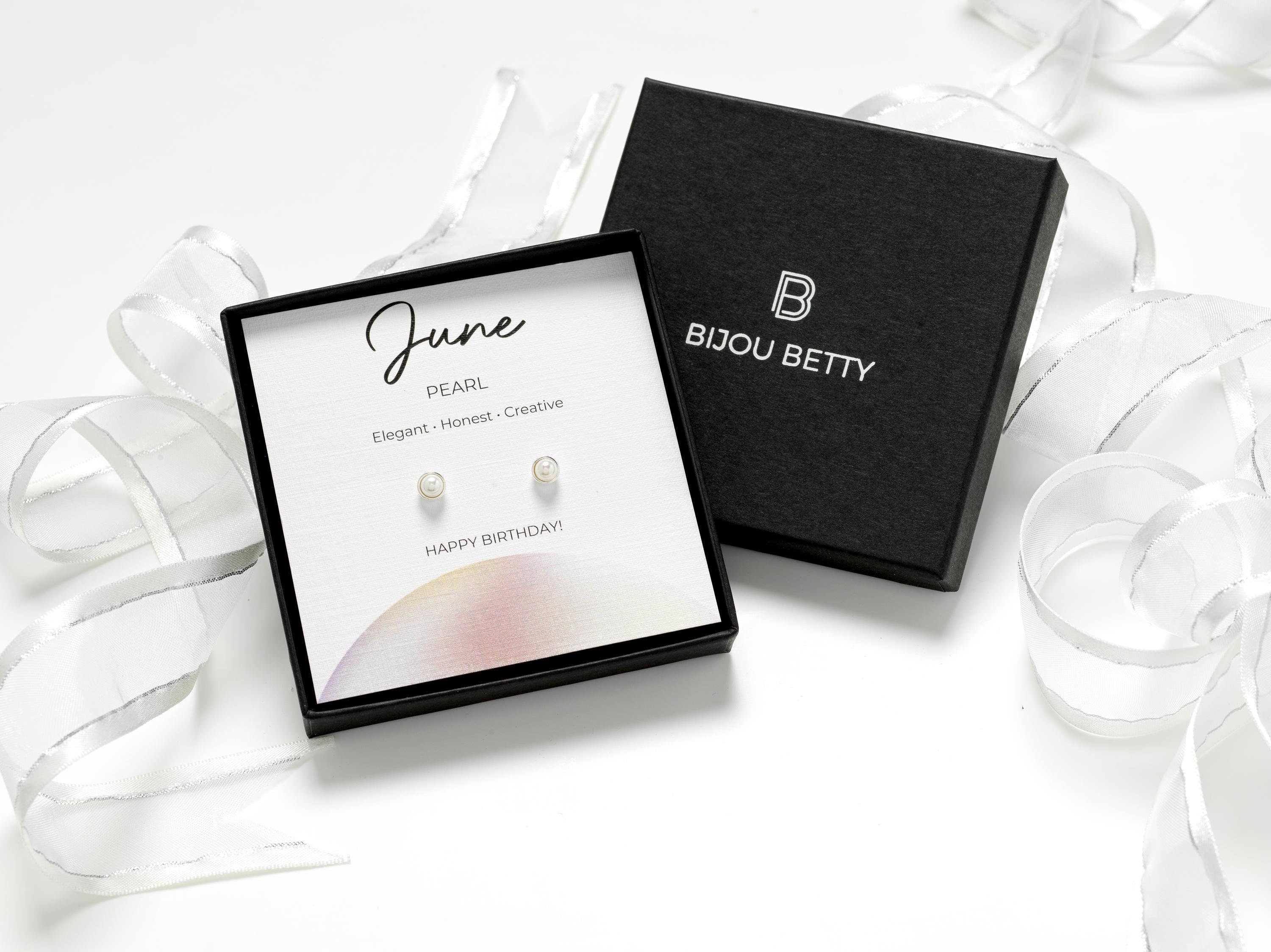 Sterling silver June birthstone earrings with 4mm synthetic pearl. Perfect gift for daughter, sister, granddaughter, niece, or friend. Includes gift box, bag, tissue, and card highlighting traits: elegant, honest, creative.