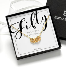 Gold plated 50th birthday 5 ring necklace in Bijou Betty gift box.